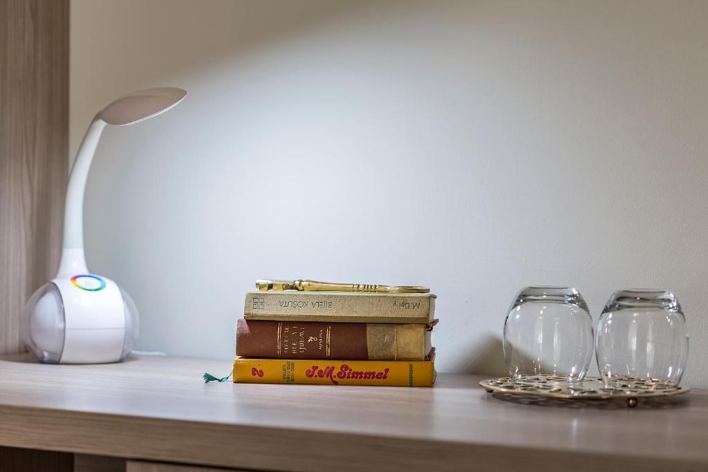 Books and lamp detail at Piano Nobile Rooms in Split