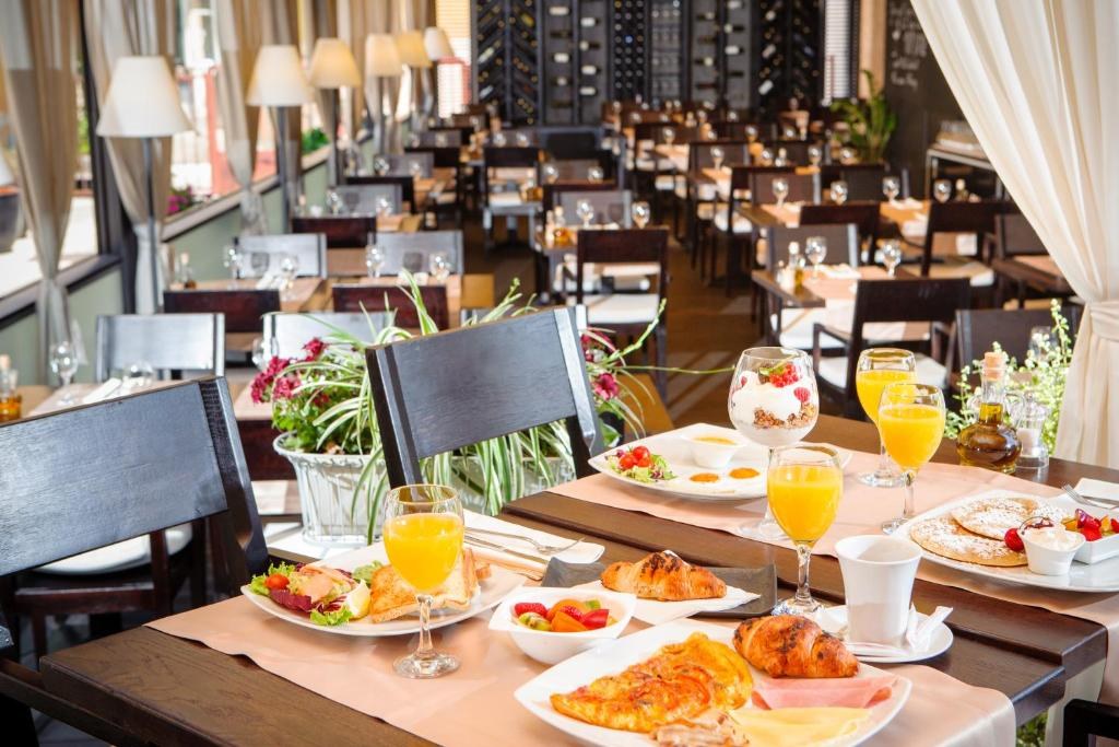 Breakfast served at a nearby restaurant at Piano Nobile Rooms in Split